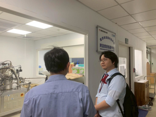 Dr. Phuoc Huu Le (left) introduced Dr. Kolawach Chalermpong (right) to the Center for Plasma and Thin Film Technologies.(Open new window/png file)Image