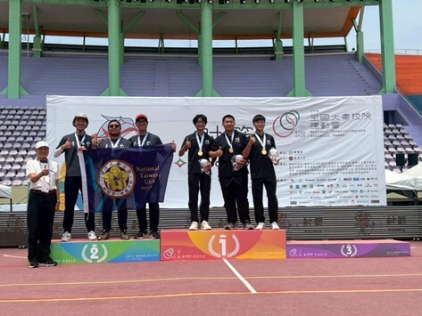 Photo of the men's compound archery team posing with their gold medals.(Open new window/jpg file)Image