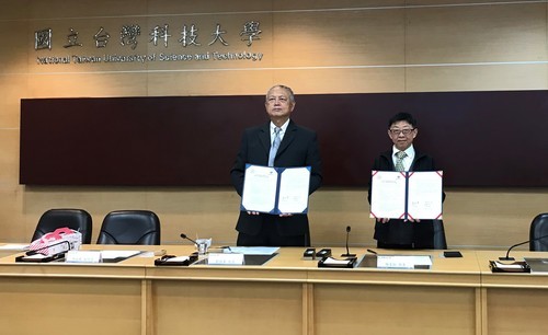 Both Presidents Holding Signed MoU(Open new window/jpg file)